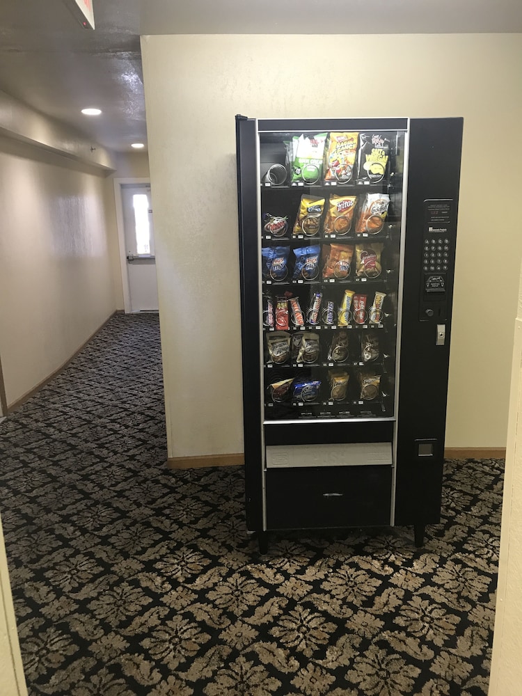 Laundry room, Super 8 by Wyndham Bridgeview of Mackinaw City