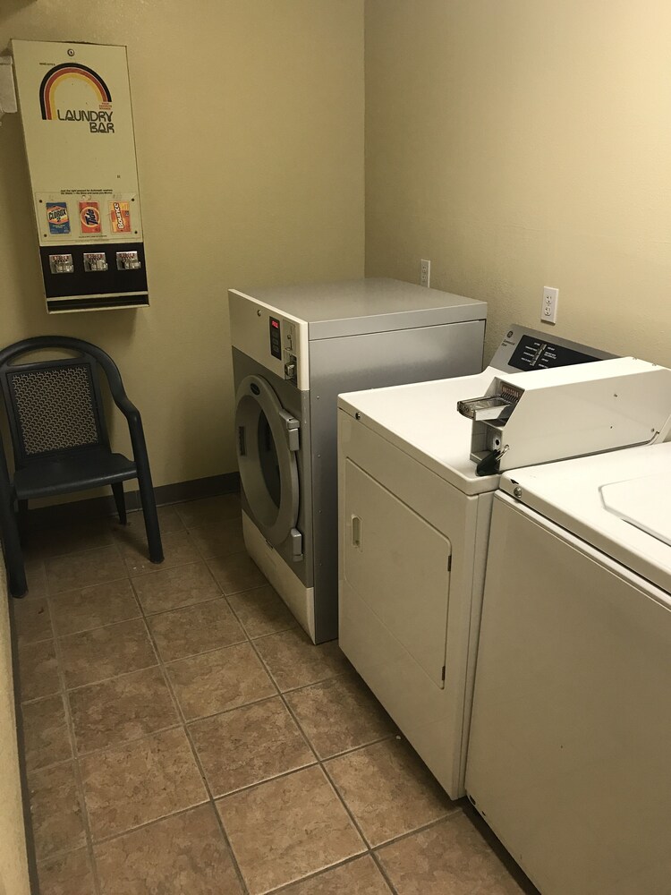 Laundry room, Super 8 by Wyndham Bridgeview of Mackinaw City