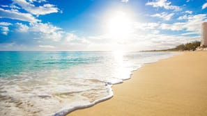 Private beach, white sand, sun loungers, beach towels