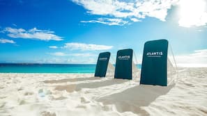 Private beach, white sand, sun loungers, beach towels
