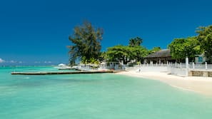 Private beach, white sand, sun-loungers, beach towels