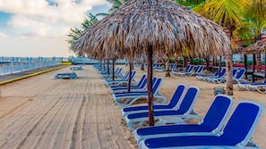 Private beach, white sand, sun-loungers, beach towels