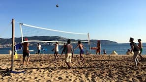 On the beach, sun loungers, beach umbrellas, beach towels