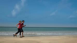 On the beach, white sand, free beach cabanas, sun loungers