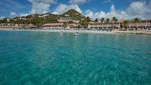 On the beach, white sand, free beach cabanas, sun loungers