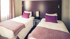 Coffre-forts dans les chambres, rideaux occultants