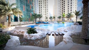 2 outdoor pools, pool umbrellas, pool loungers