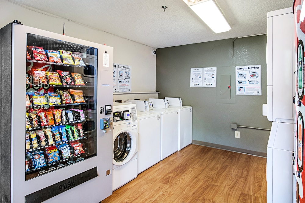 Laundry room, HomeTowne Studios by Red Roof Atlanta - Lawrenceville