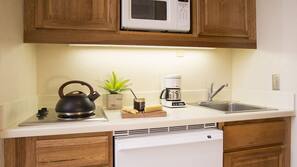 Fridge, microwave, cookware/dishes/utensils