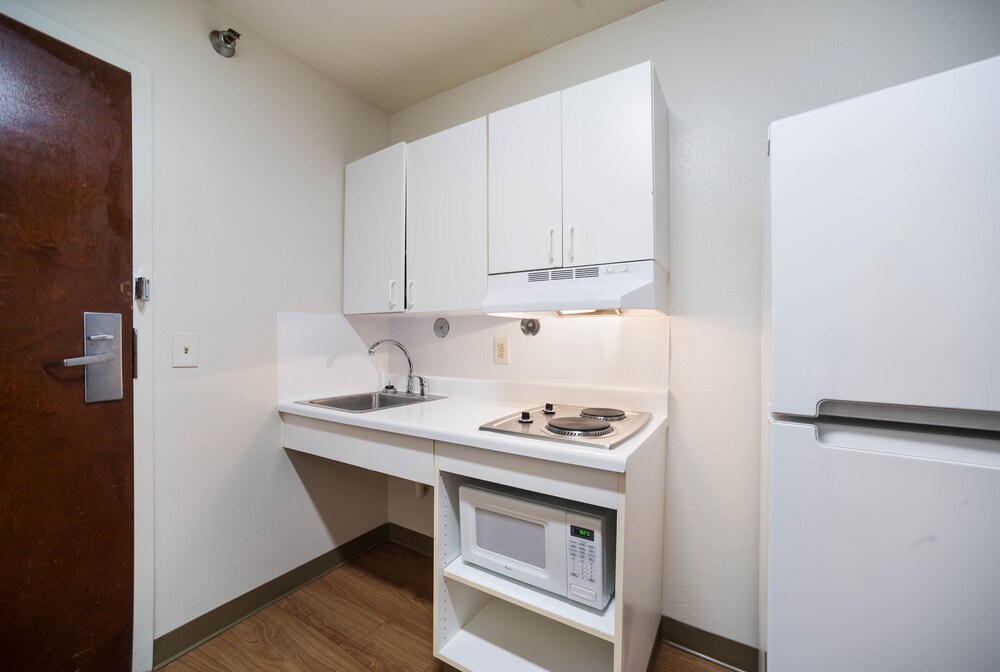 Private kitchen, HomeTowne Studios by Red Roof St. Louis - Airport/ N Lindbergh