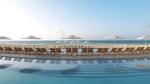 Outdoor pool, pool umbrellas, pool loungers