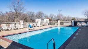 Seasonal outdoor pool, open 10:00 AM to 10:00 PM, sun loungers