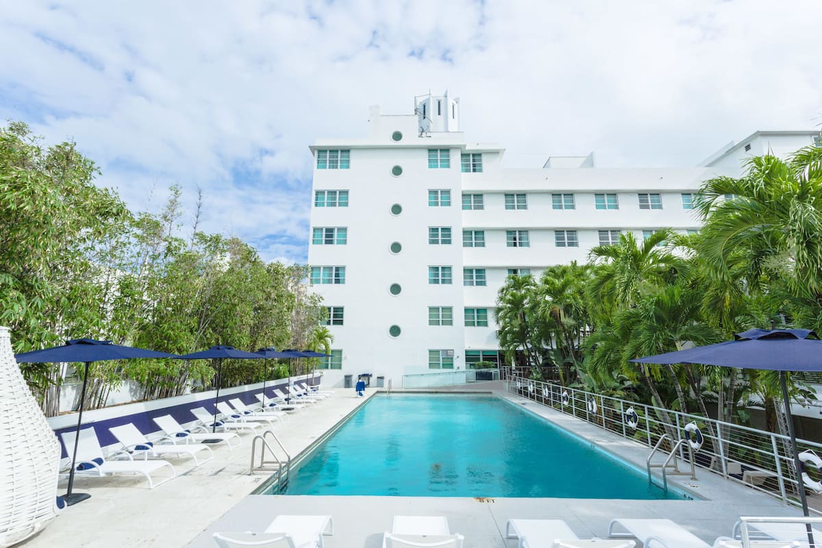 Outdoor pool, open 7:00 AM to 7:30 PM, pool umbrellas, sun loungers