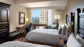 Premium bedding, down comforters, pillowtop beds, minibar