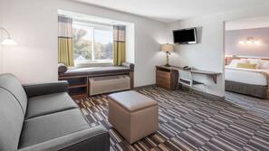 Premium bedding, pillow top beds, desk, laptop workspace