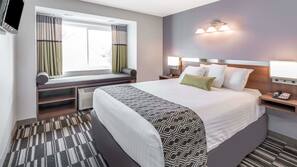 Premium bedding, pillow top beds, desk, laptop workspace