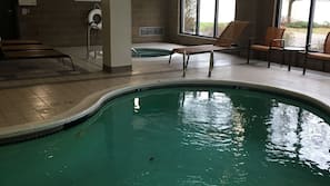 Indoor pool, open 6 AM to 11 PM, pool loungers