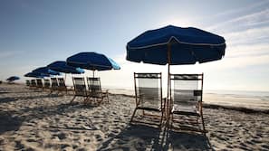 On the beach, free beach shuttle, sun loungers, beach umbrellas