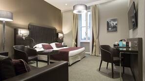 Premium bedding, memory-foam beds, free minibar, in-room safe