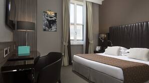 Premium bedding, memory-foam beds, free minibar, in-room safe