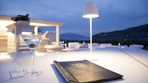 Outdoor pool, open 9:00 AM to 6:00 PM, pool loungers