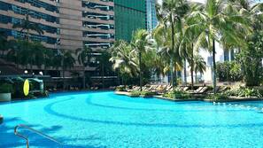 Outdoor pool, open 7:00 AM to 10:00 PM, pool umbrellas, pool loungers
