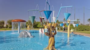 Indoor pool, outdoor pool, pool umbrellas