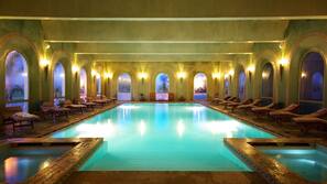 Indoor pool, outdoor pool, pool umbrellas