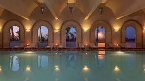 Indoor pool, outdoor pool, pool umbrellas