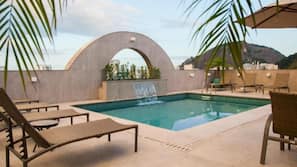 Outdoor pool, pool umbrellas, pool loungers