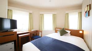 Desk, blackout curtains, free WiFi, linens