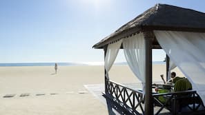Private beach, white sand, free beach cabanas, sun-loungers