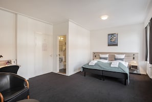 Family Quadruple Room, 1 Bedroom | Desk, blackout drapes, iron/ironing board, free WiFi