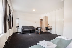Family Quadruple Room, 1 Bedroom | Desk, blackout drapes, iron/ironing board, free WiFi