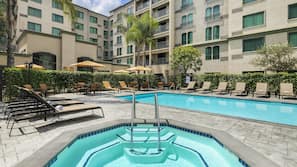 Outdoor pool, pool umbrellas, pool loungers