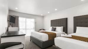 Desk, blackout curtains, free WiFi, linens