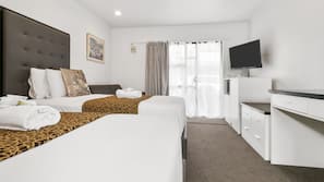 Desk, blackout curtains, free WiFi, linens