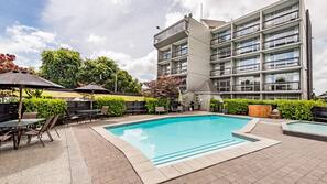 Outdoor pool, pool umbrellas, pool loungers