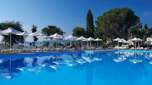 2 outdoor pools, pool umbrellas, pool loungers
