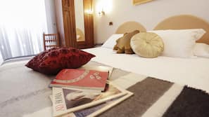 Biancheria da letto di alta qualità, minibar, cassaforte in camera