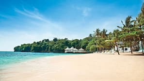 Private beach, white sand, sun loungers, beach towels