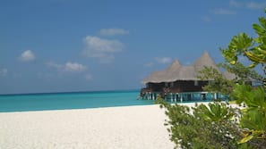 Private beach, white sand, sun-loungers, beach umbrellas