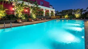 Outdoor pool, open 7:00 AM to 9:00 PM, pool umbrellas, pool loungers