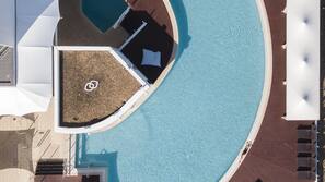 2 outdoor pools, open 6:00 AM to 6:00 PM, free pool cabanas