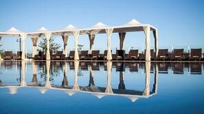 2 outdoor pools, open 6:00 AM to 6:00 PM, free pool cabanas