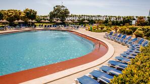 Indoor pool, outdoor pool, pool umbrellas