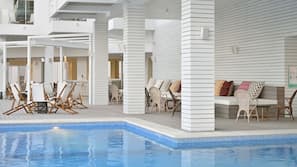 3 outdoor pools, open 8 AM to 8 PM, pool umbrellas, pool loungers