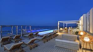 3 outdoor pools, open 8 AM to 8 PM, pool umbrellas, pool loungers