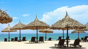 Private beach, white sand, sun loungers, beach umbrellas