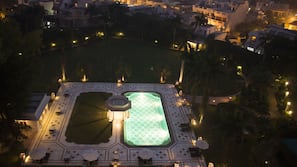 Seasonal outdoor pool, pool loungers